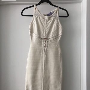 Herve leger bandage eggshell dress.